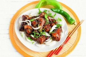 Острые и пряные свиные хвостики по-китайски